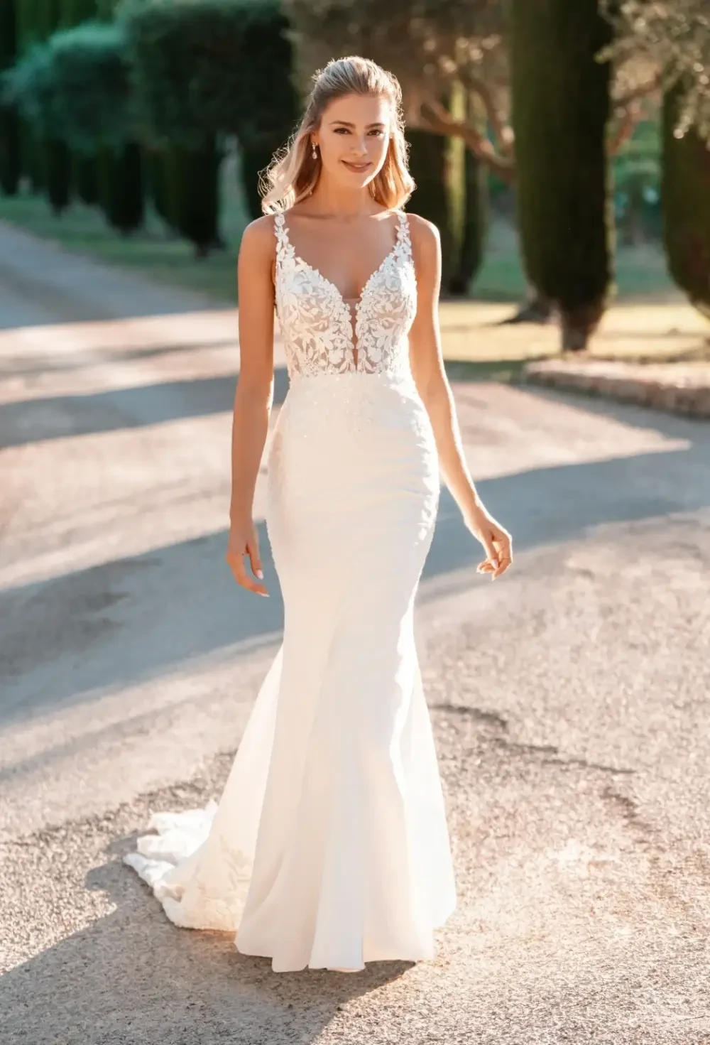 Model wearing a gown by Allure Bridals
