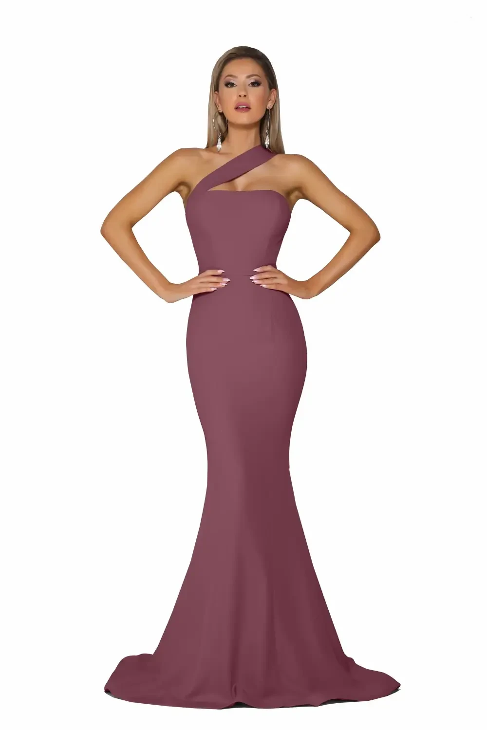 A woman wearing a form-fitting, one-shoulder maroon dress with a mermaid silhouette.