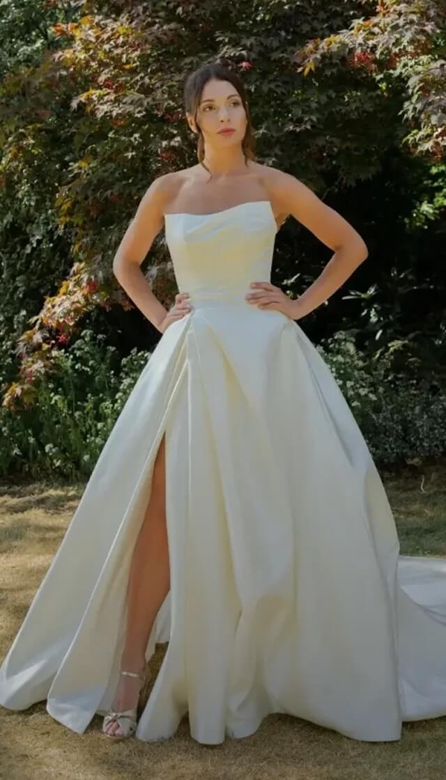 Model wearing a gown by Signature Private Label